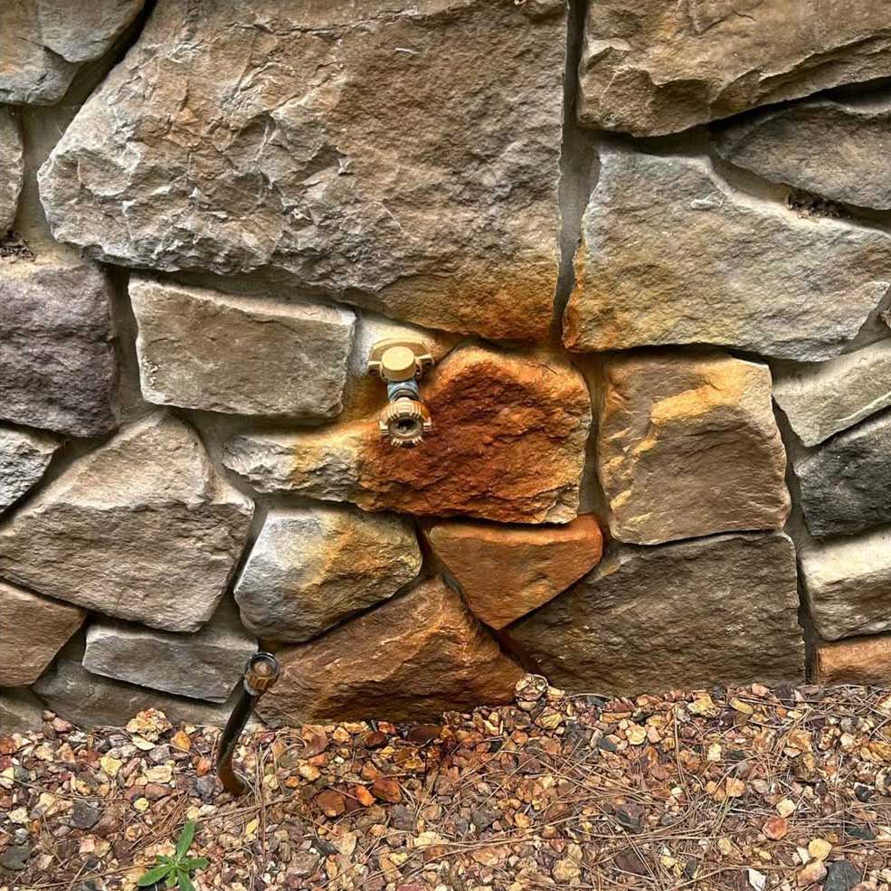 stone siding before cleaning